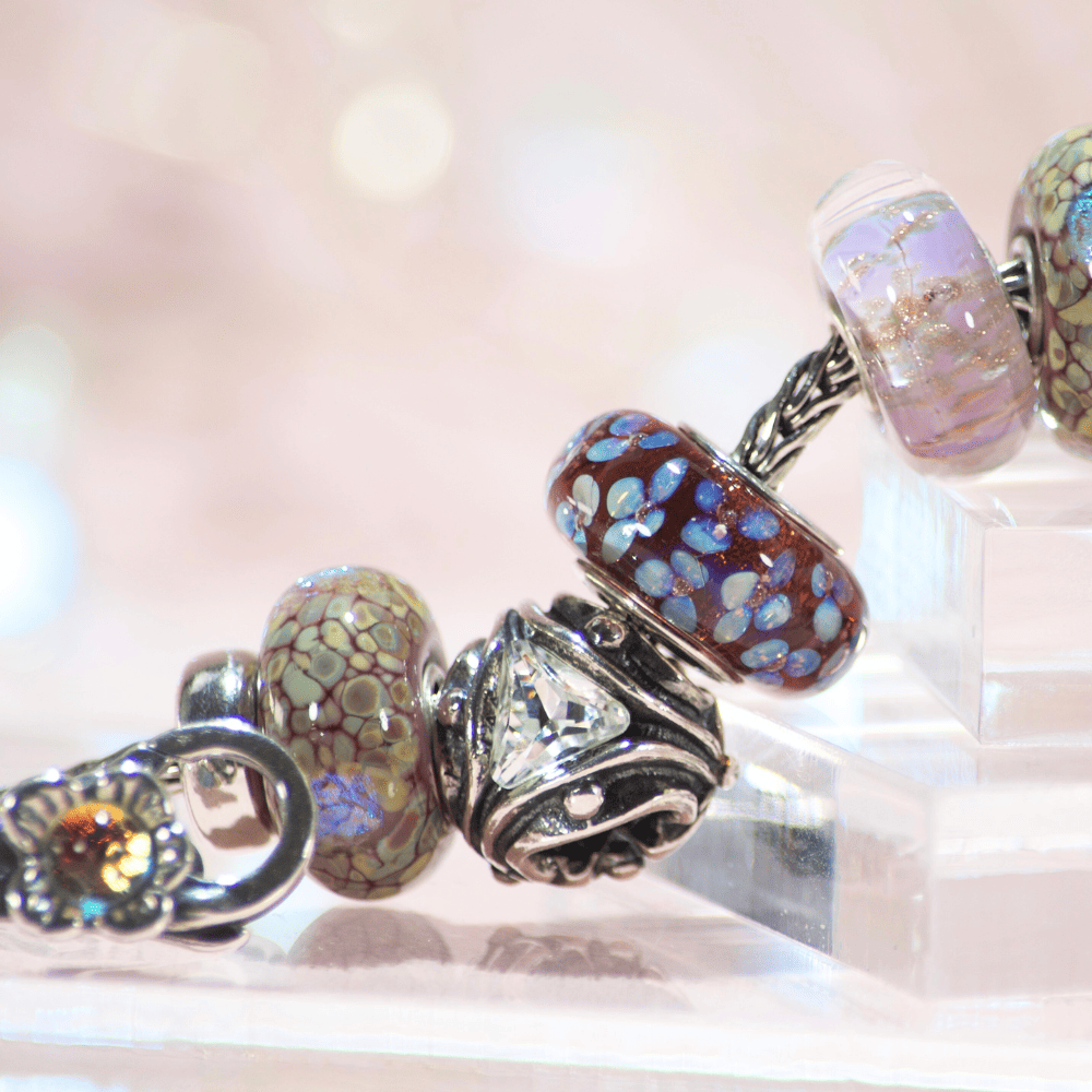 image of a purple and silver dichroic trollbeads european bead bracelet