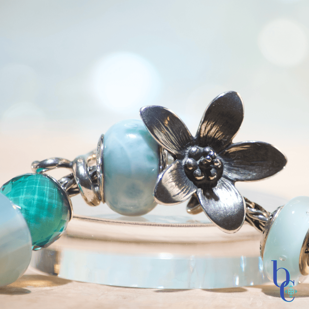 Macro of design focal colors with pearls and aqua beads