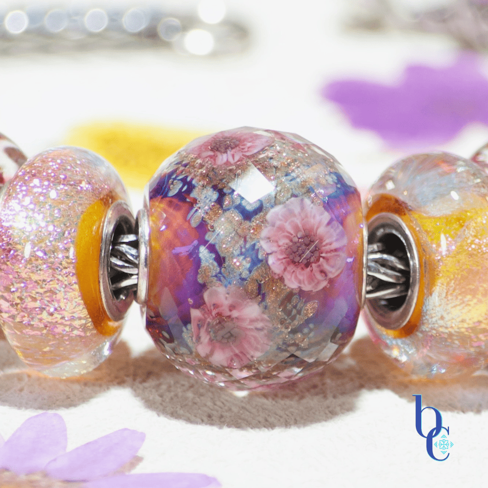 Macro shot of a Elfbeads Cherry Blossom Shimmering World charm .