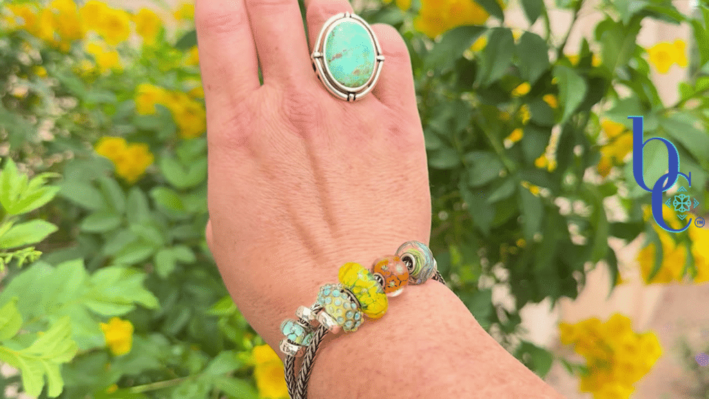 An outdoor natural shot of the 2 strand bracelet hack design on a woman's wrist in natural light.