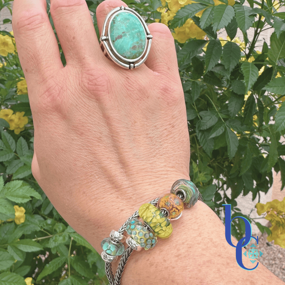 An outdoor natural shot of the 2 strand bracelet hack design on a woman's wrist in natural light.