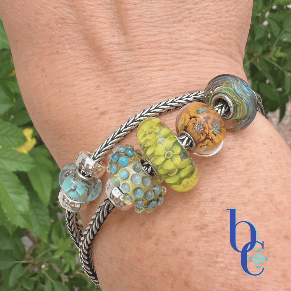 An outdoor natural shot of the 2 strand bracelet hack design on a woman's wrist in natural light.